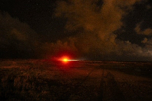 Car stuck on Southport Beach, late at night - Sefton Coastline Warning - Do not drive on the shore